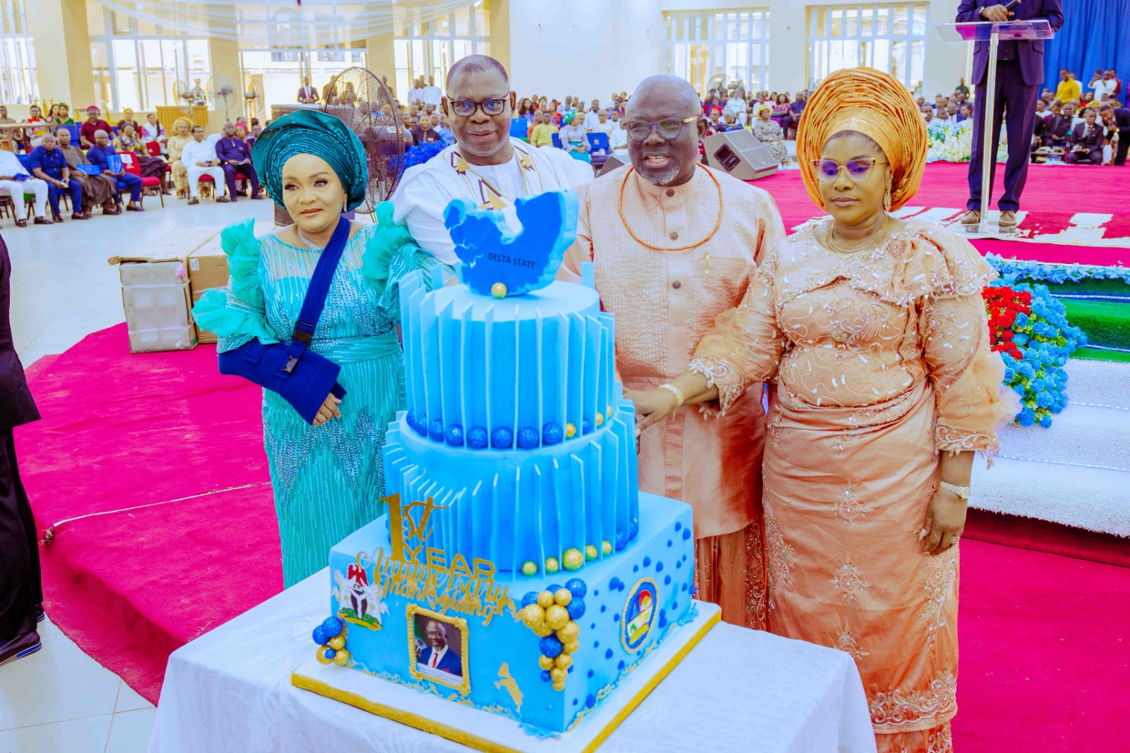 Delta Governor, Rt Hon Sheriff Oborevwori (2nd right), his Wife, Deaconess Tobore Oborevwori (right), Deputy, Sir Monday Onyeme (2nd left), and his Wife, Lady Catherine Onyeme, cutting the anniversary cake shortly after a thanksgiving service to mark the Governor's first year in office at Living Faith Church, Asaba
