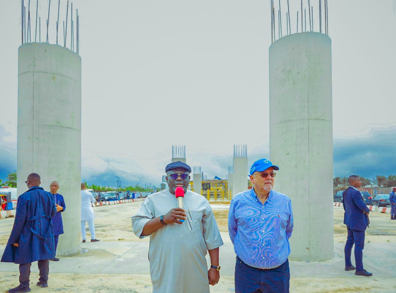 Governor Sheriff Oborevwori (left) answering questions from Journalists shortly after inspecting the ongoing work on the Effurun roundabout/PTI junction and DSC Roundabout flyovers and road expansion projects on Sunday, while the South-South/South East Project manager, Julius Berger, Mr. Thomas Haug looks on.