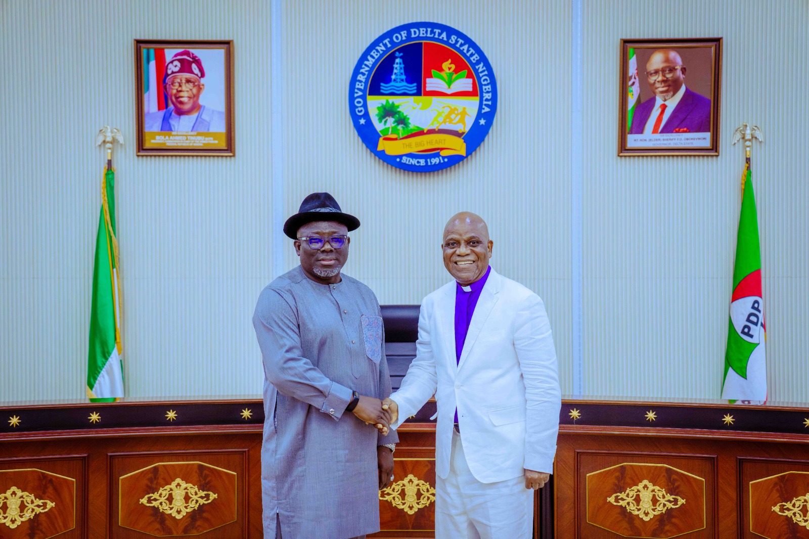 Governor Sheriff Oborevwori (left) in warm handshake with the Chairman, Pentecostal Fellowship of Nigeria, Delta State, Bishop Kingsley Enakirerhi when he led the state Exco of the body on a courtesy visit to the Governor at Government House, Asaba on Wednesday, August 7, 2024