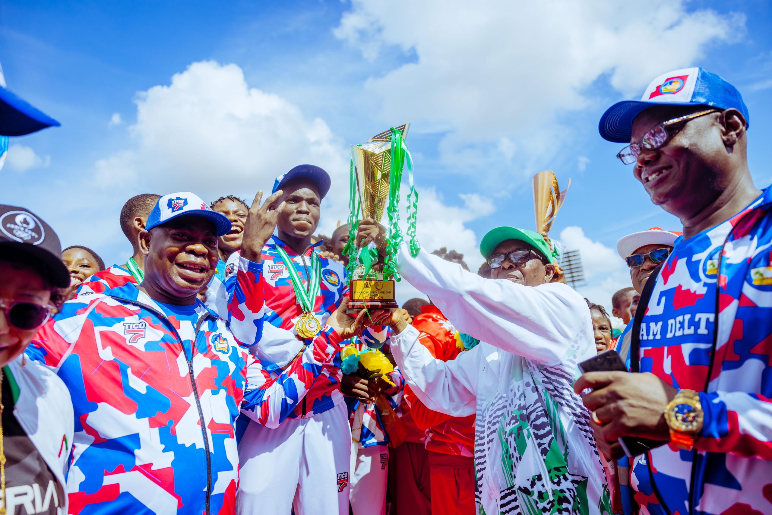 Delta State Deputy Governor, Sir Monday Onyeme (left), receiving the Trophy from a Director of the Federal Ministry of Sports Development, Mr. Patrick Okeke at the closing ceremony of the 8th National Youth Games (Delta 2024), held at Stephen Keshi's Stadium in Asaba on Thursday, September 19, 2024