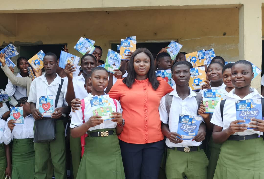 Executive Director, Eye on the Future Initiative, Comrade Josephine Omodior with Students of Oviri-Ogor Secondary School