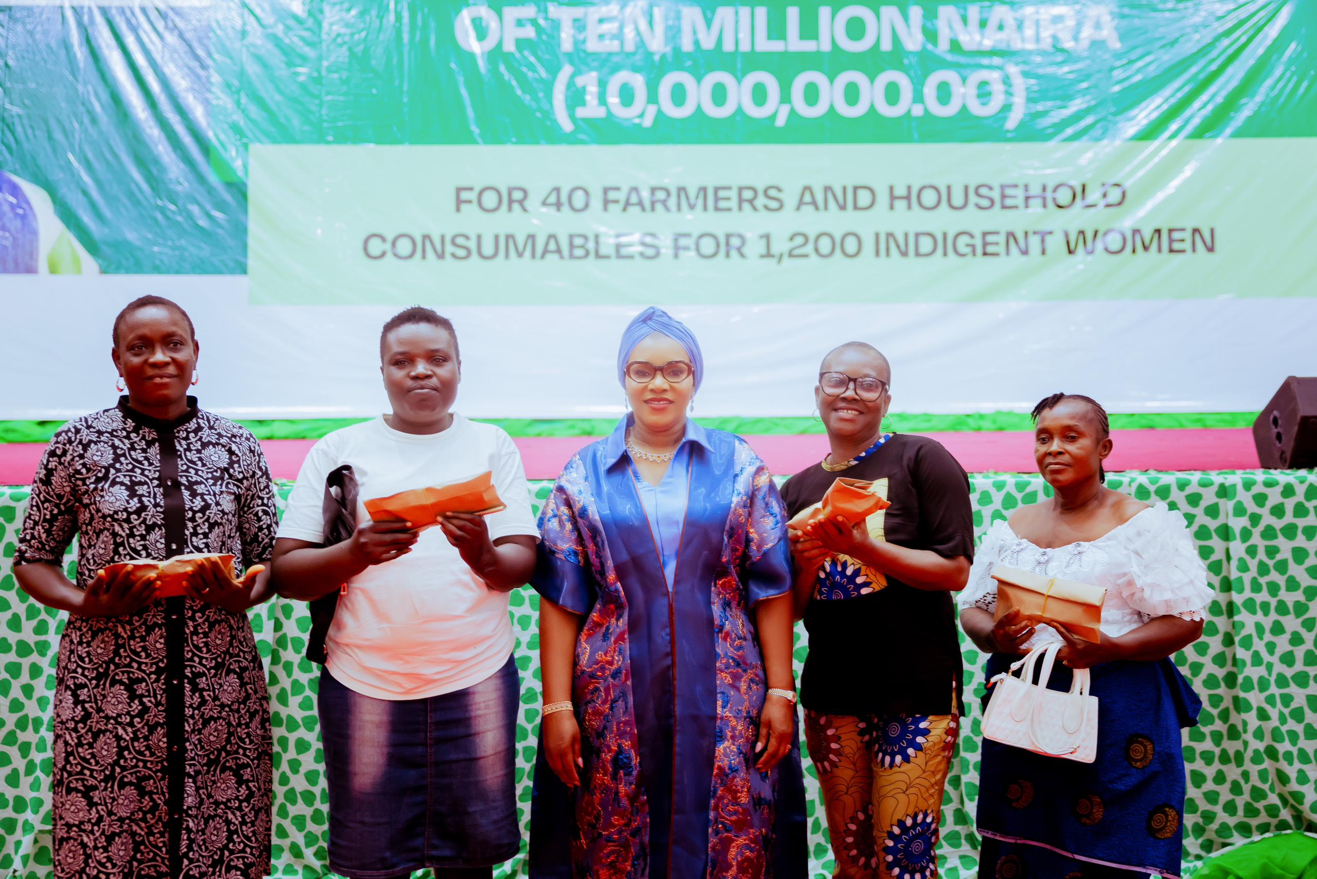 Wife of the Delta State Governor, Deaconess Tobore Oborevwori (middle), with some of the beneficiaries of the Renewed Hope Initiative's N10 million grant for 40 farmers during the disbursement of the grant in Asaba on Thursday, September 12, 2024. The beneficiaries are Hope Eboghare (left), Promise Lazarus (2nd left), Awele Ohaegbulem (2nd right), and Mercy Isheno.