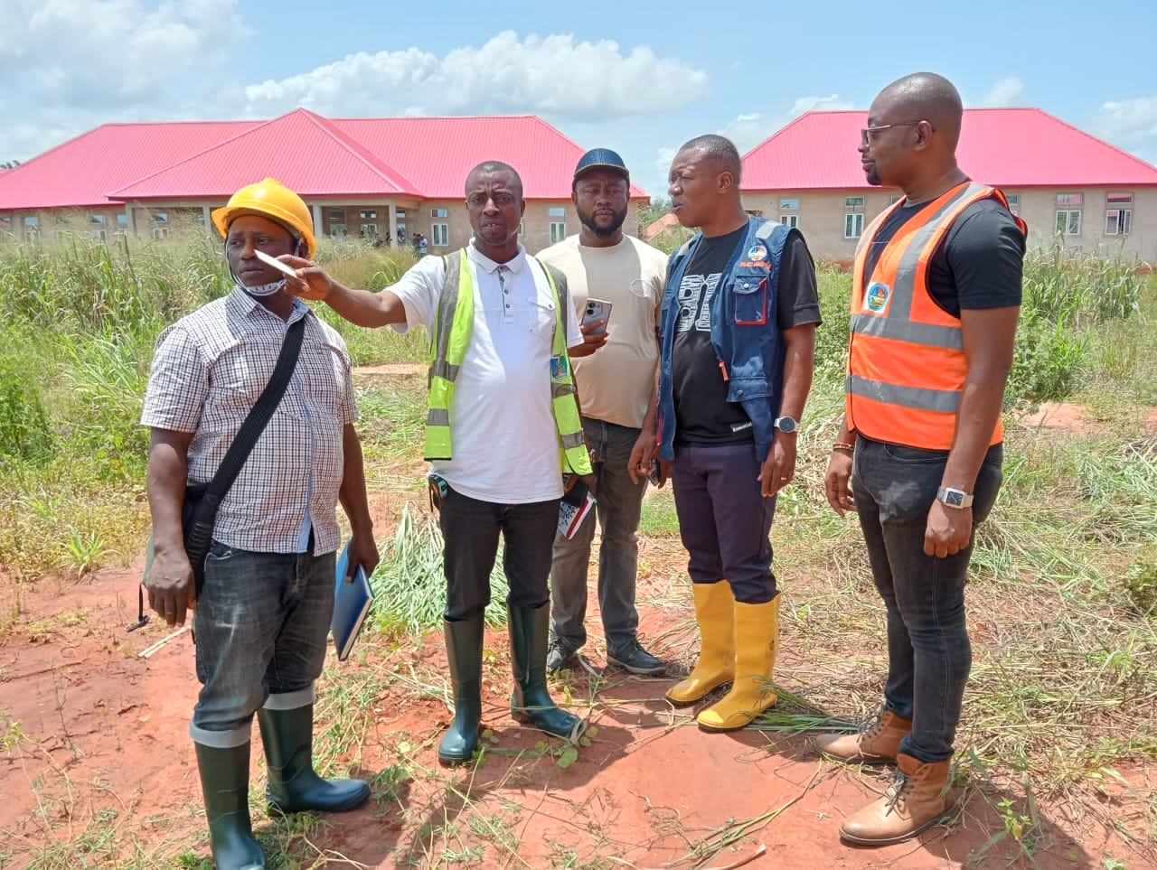 Engr. Jonathan Onos Evwierhurhoma (in white) giving directives to the contractor handling the construction of General Hospital, Ute-Okpu, Ika North East.