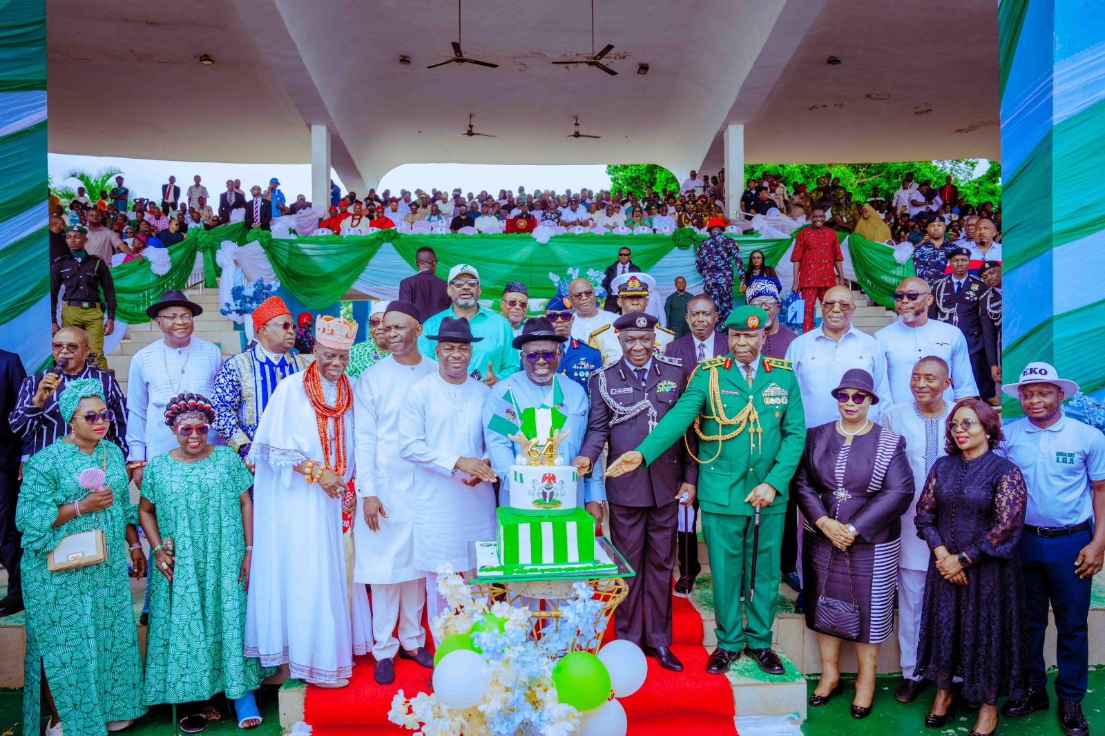 Delta Governor, Rt Hon Sheriff Oborevwori (6th left), assisted by immediate past Deputy Governor, Barr. Kingsley Otuaro, back role (2nd right), Speaker, State House of Assembly, Rt Hon Emomotimi Guwor (5th left), member representing Ika Federal Constituency, Hon Victor Nwokolo (4th left), representative of the State Chief Judge, Justice Azinge (2nd right), President, Customary Court of Appeal, Justice Ngozi Ojugbana-Oritsedere right), the Orodje of Okpe Kingdom and Chairman, Delta State Council of Traditional rulers, HRM, Major Gen Felix Mujakperuo (4th left), Service Chiefs, and other dignitaries cutting the Anniversary Cake during the 64th Independence Day celebration at Cenotaph, Asaba on Tuesday, October 1, 2024