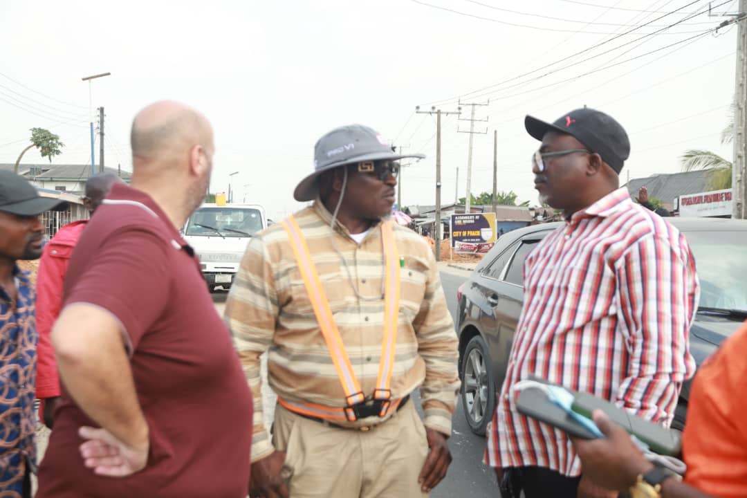 Commissioner for Works, Highways and Urban Roads, Comrade Reuben Izeze (middle) discussing with the Chief Press Secretary to the Governor, Sir. Festus Ahon (right) shortly after Inspecting the maintenance of Uti Road on Wednesday,  while the Project Manager Mr. Milad Boutros (left) look on.