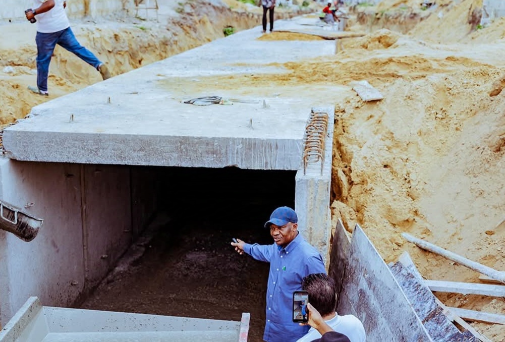 Commissioner for Works (Rural Roads) and Public Information, Mr. Charles Aniagwu during the inspection of the ongoing water storm drainage at Dare Akintoye Street, Ugolo-Okpe, Wednesday, January 22, 2025