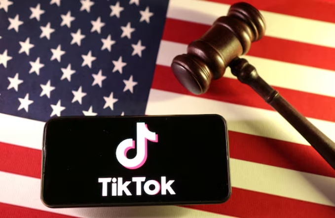 U.S. flag, TikTok logo and gavel /Illustration/