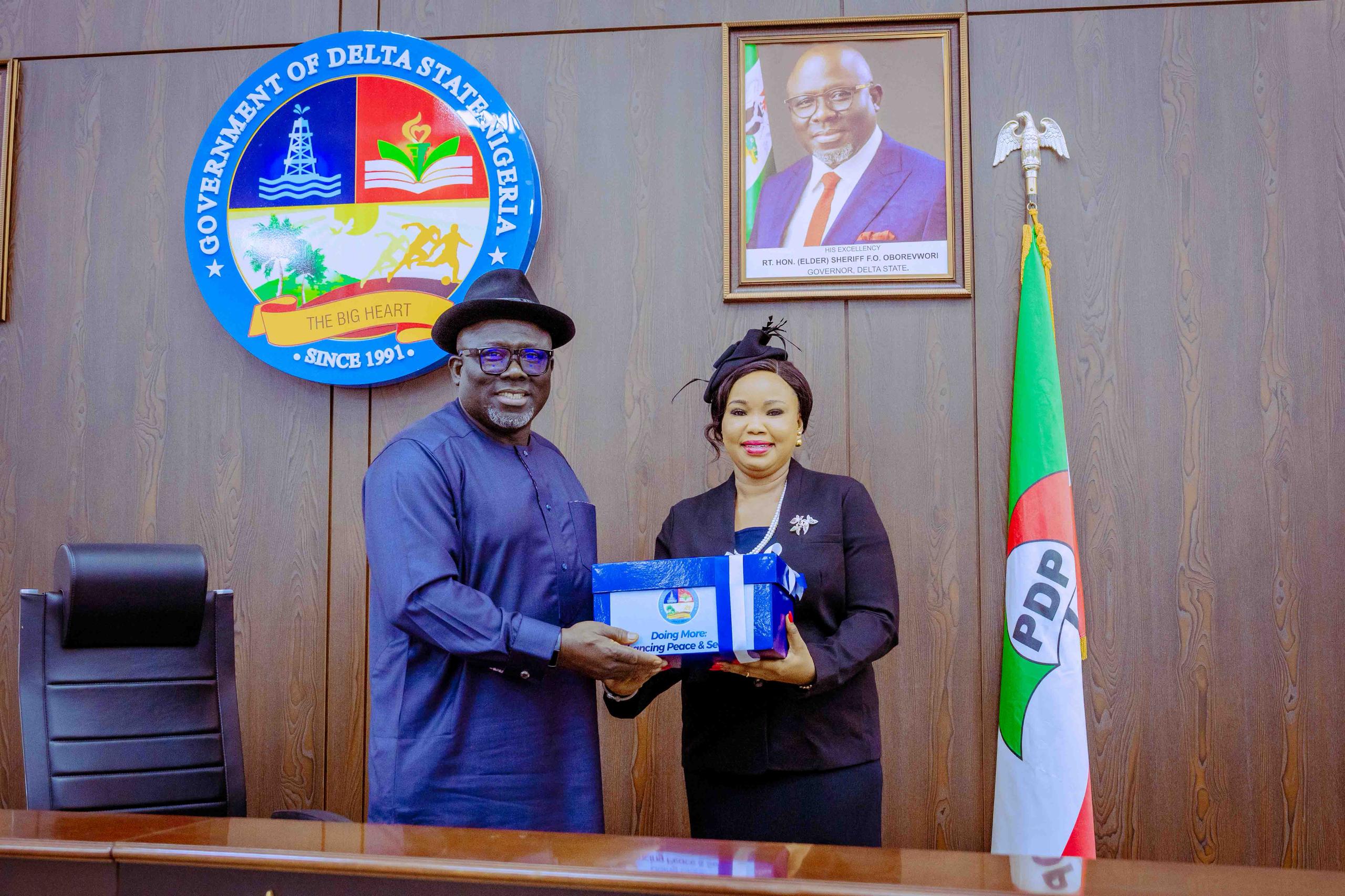 Delta State Governor, Rt. Hon. Sheriff Oborevwori (left) receiving the report of kingship/land dispute in Ogwashi-Uku Kingdom in Aniocha South local government and neighbouring communities in the state, from the Chairman of the Commission of Inquiry, Hon. Justice Ejiro Emudainowho (right) at Government House, Asaba on Tuesday, March 11, 2025